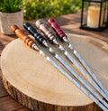 “Standard” skewers with wooden handles. Made from 3 mm stainless steel.